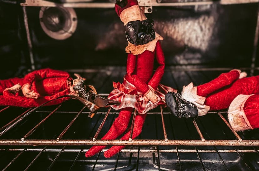 Three Elf on the Shelf elves charred in an oven.