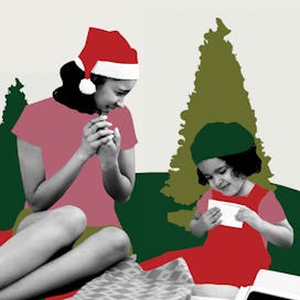 A mother and daughter opening Christmas presents