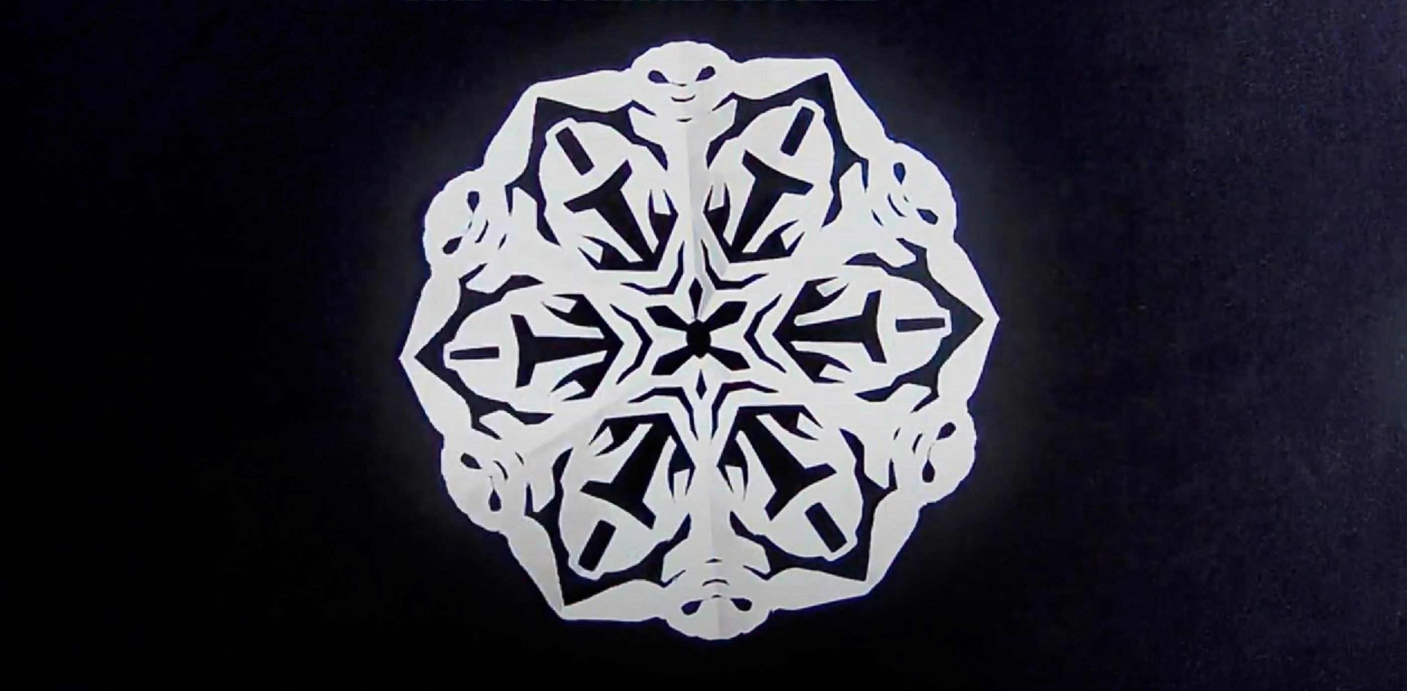 Travis Clark of Whitebread Studios on YouTube shows how to make a Baby Yoda paper snowflake inspired...