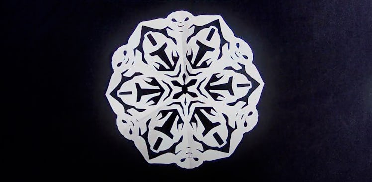 Travis Clark of Whitebread Studios on YouTube shows how to make a Baby Yoda paper snowflake inspired...