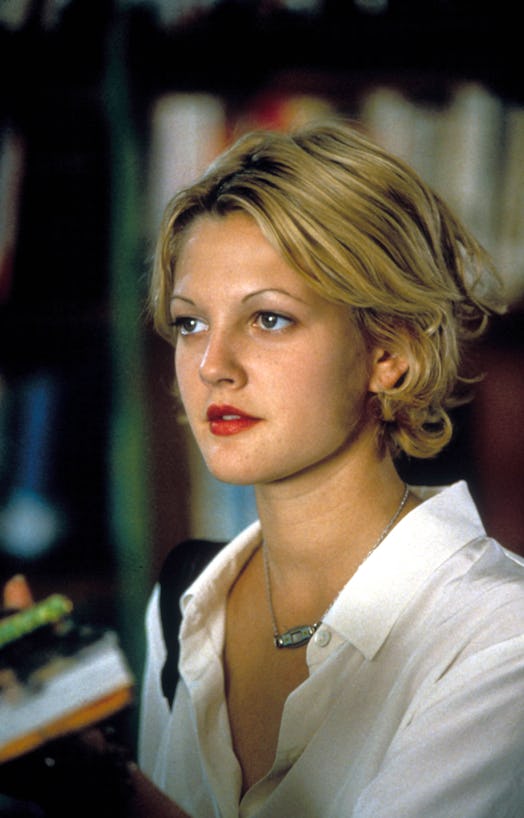 Drew Barrymore with short blonde hair in the '90s.