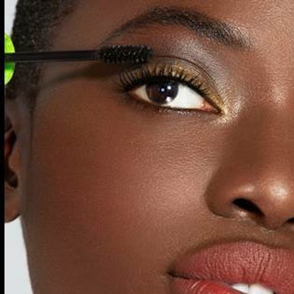 Close up of a model applying Maybelline Great Lash 
