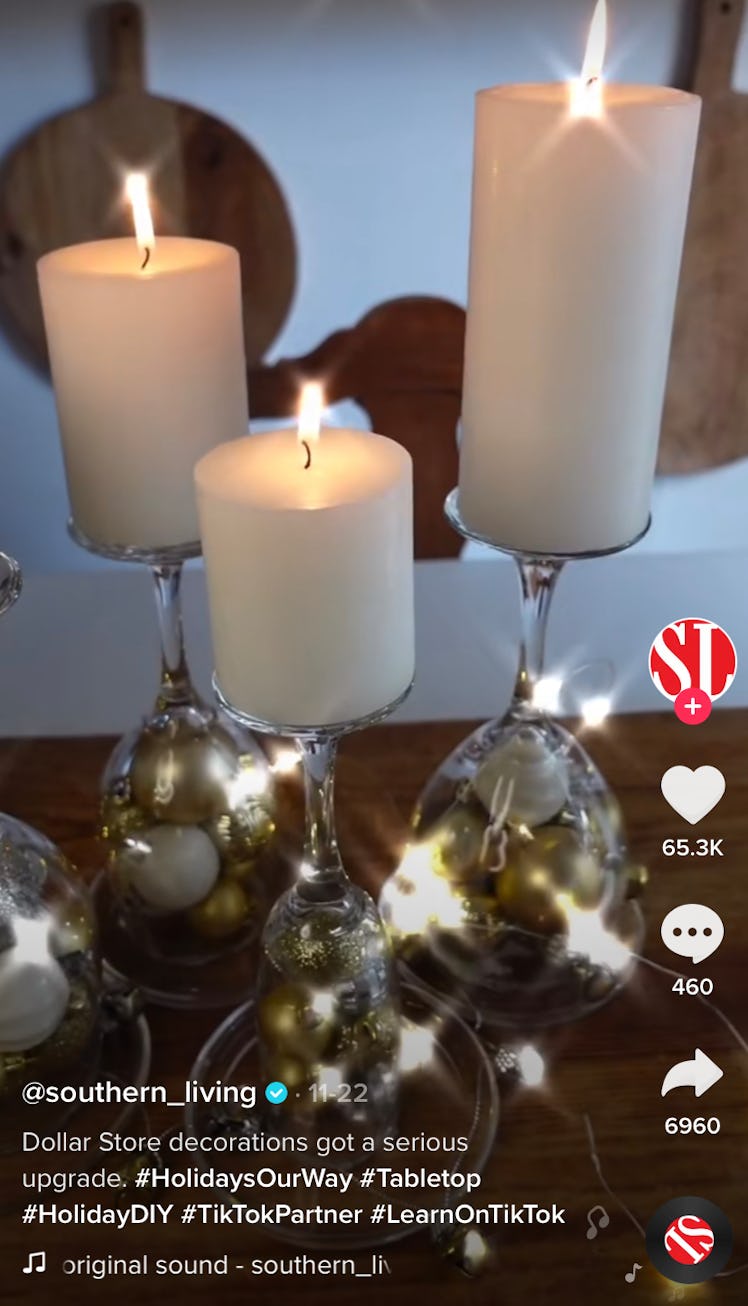 DIY candle centerpieces are lit up for the holidays. 