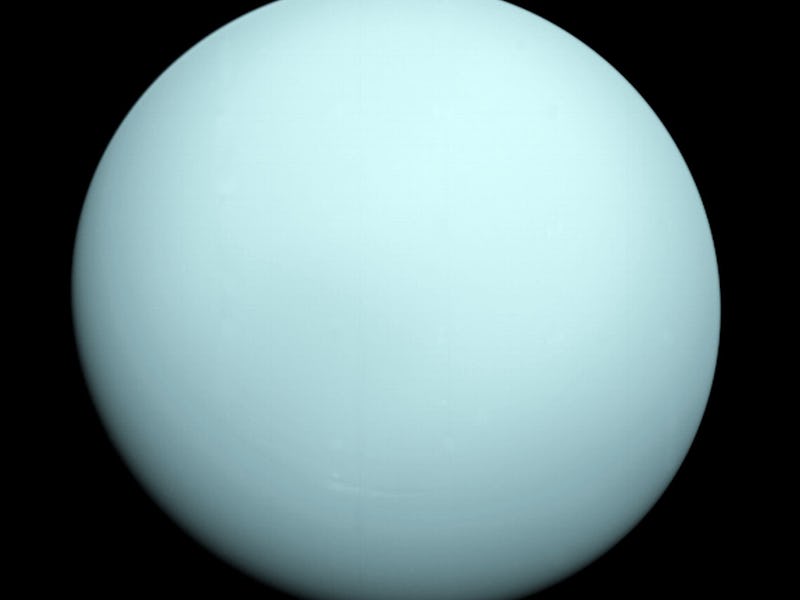 A light blue planet on black background