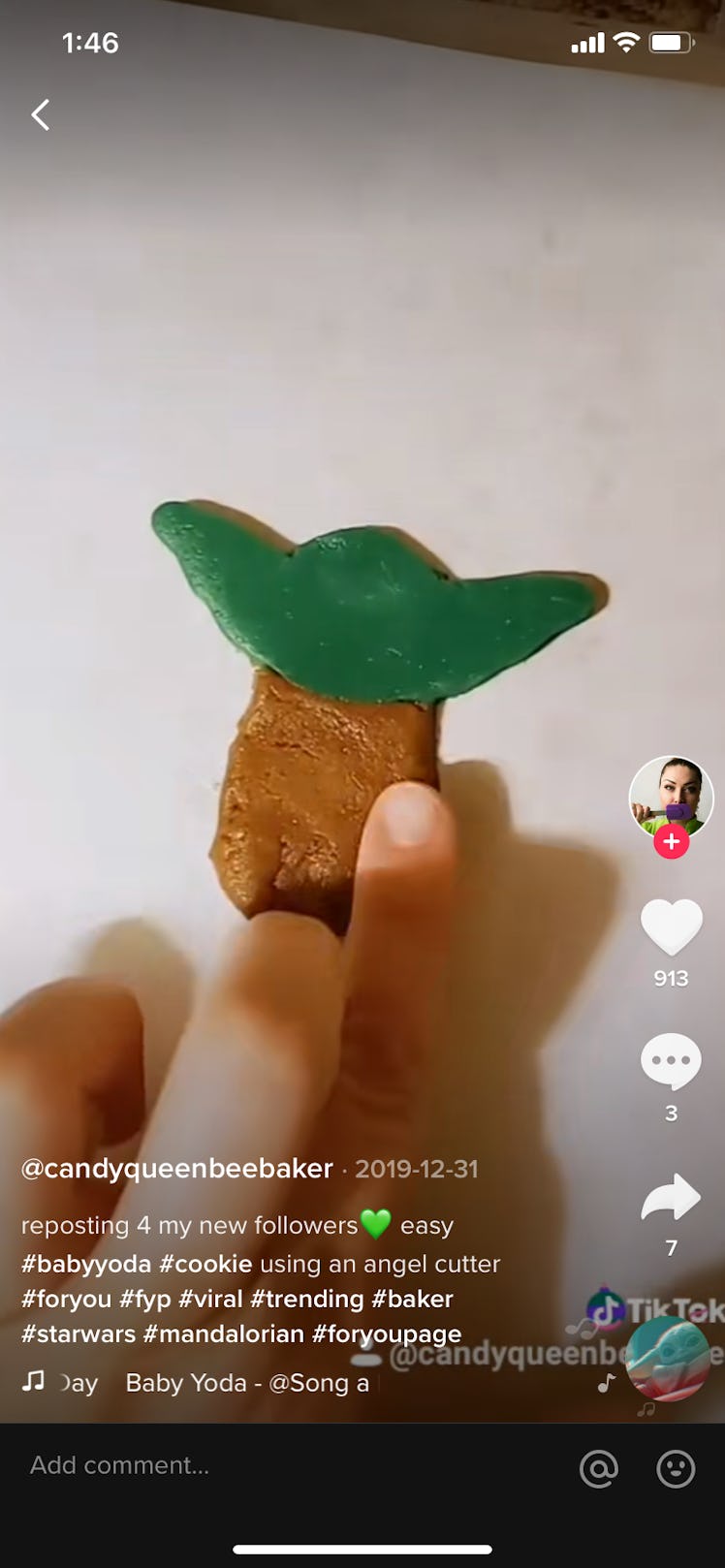 A TikTok user makes Baby Yoda cookies by placing colorful dough together.