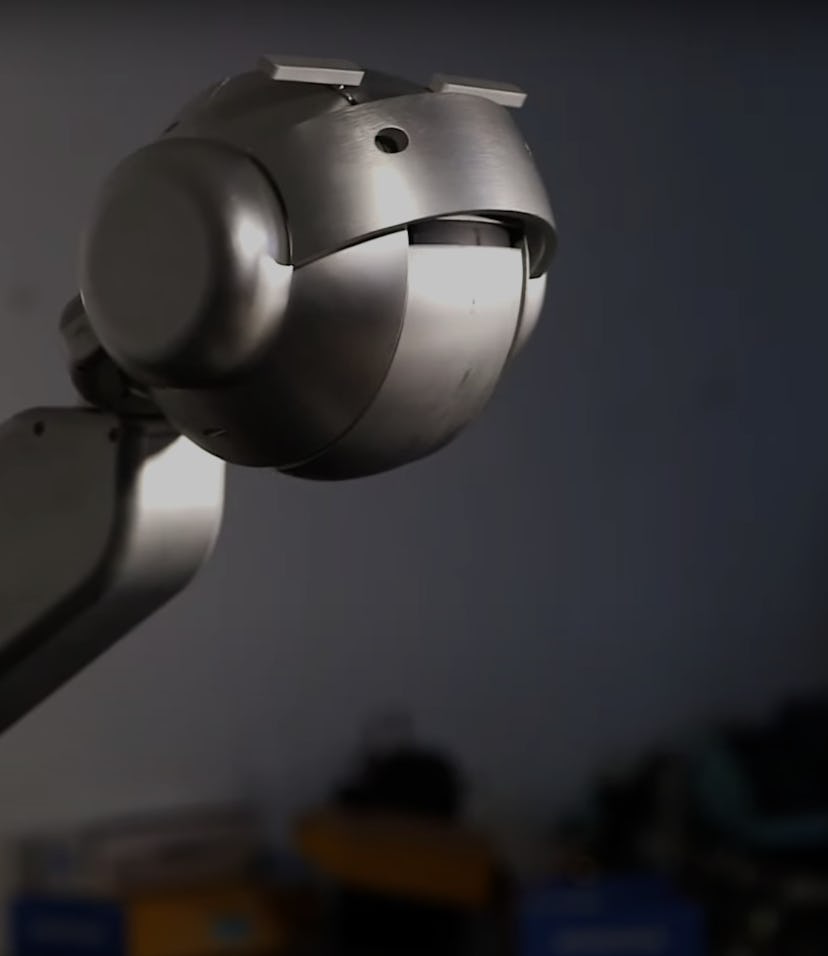 Shimon the robot, developed by Gil Weinberg, is seen mid-singing.