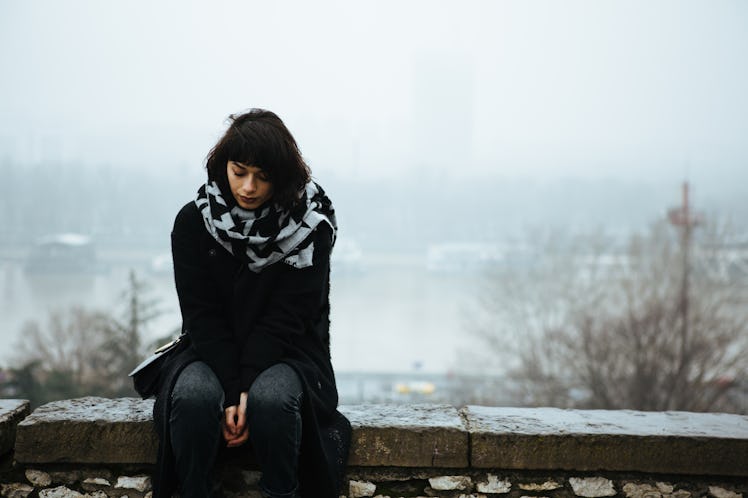 Young woman sad in December, winter