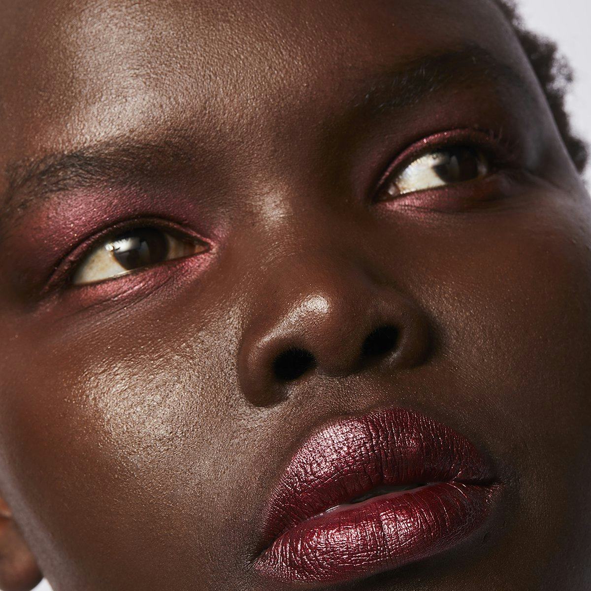 Model with pink eyeshadow and lips.