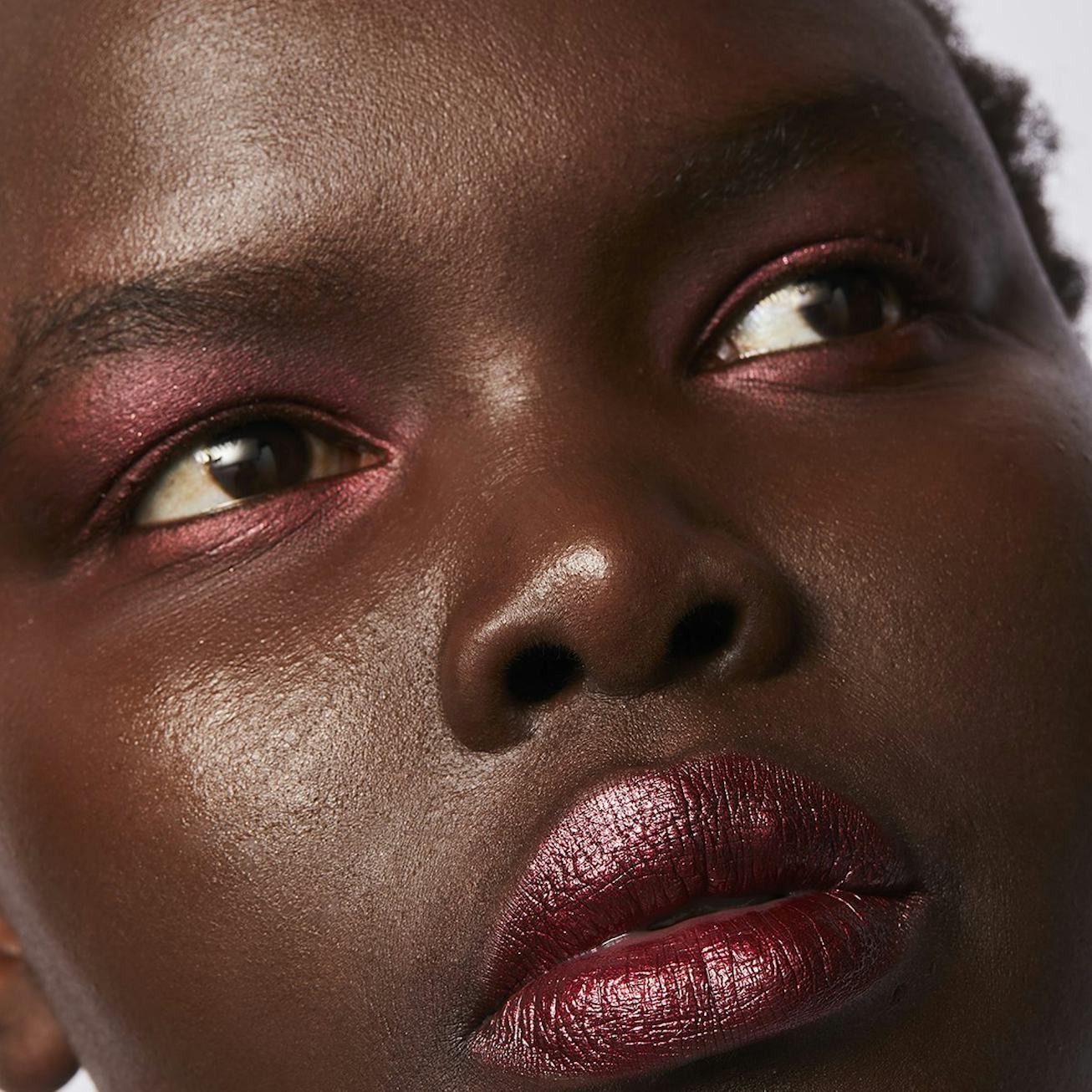 Model with pink eyeshadow and lips.