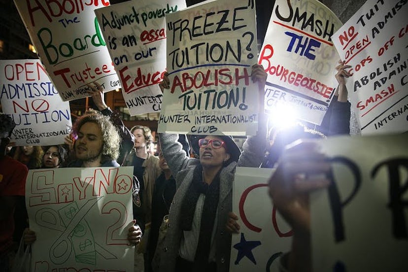 Students hold a demonstration in New York to protest against ballooning student loan debt.