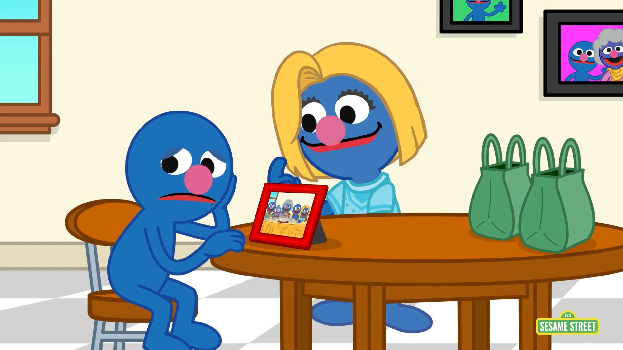 Grover's mom helps him stay connected with family during the COVID-19 pandemic. 