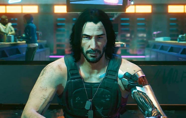 Keanu Reeves' character in Cyberpunk 2077 in a bulletproof vest with no shirt under and a gun