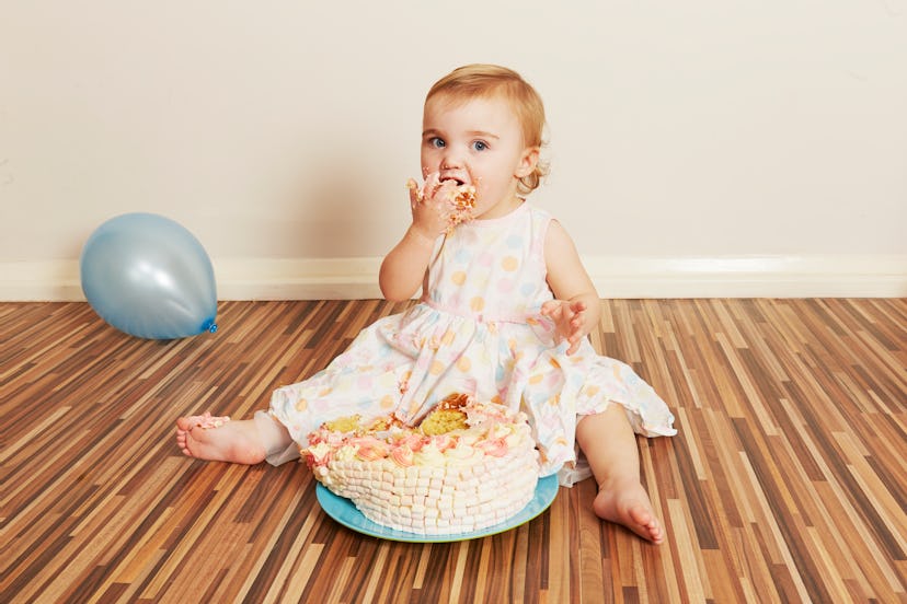 Toddler eating cake