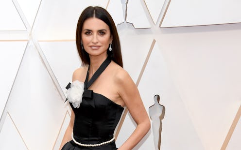 Penelope Cruz posing in a black gown