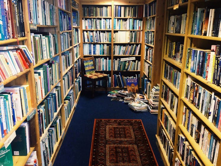 Books fill the shelves of a library that's listed on Airbnb in the UK.