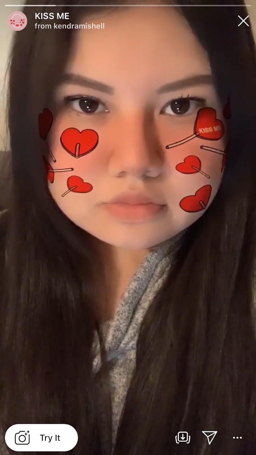 This AR filter for Valentine's Day lets you paint your face with "Kiss Me" lollipops. 