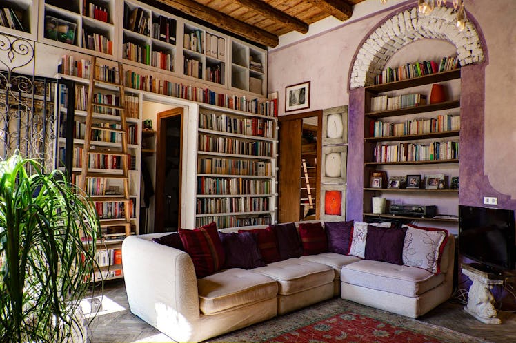 Books fill the bookshelves in the walls, just like the library in 'Beauty and the Beast,' in this ch...