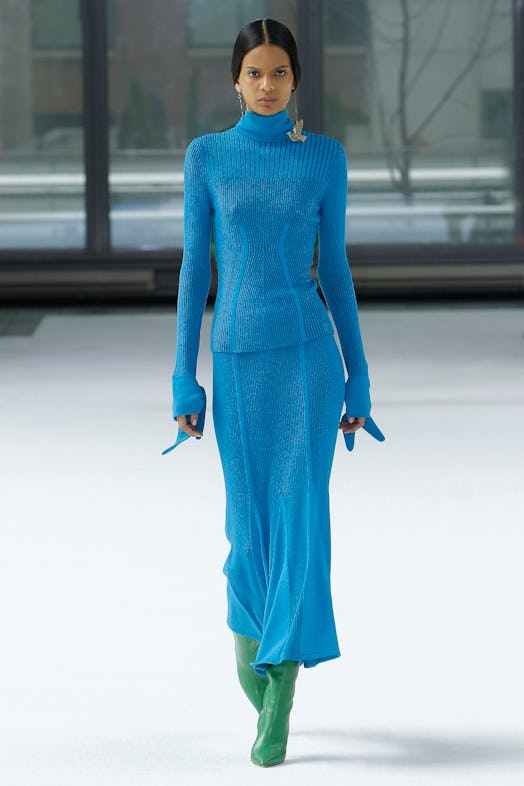 A model walking the runway in the two-piece knitwear in blue from Carolina Herrera Fall/Winter 2020 ...