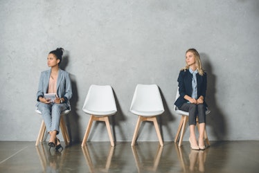 Two women sitting and waiting for their startup hiring interviews