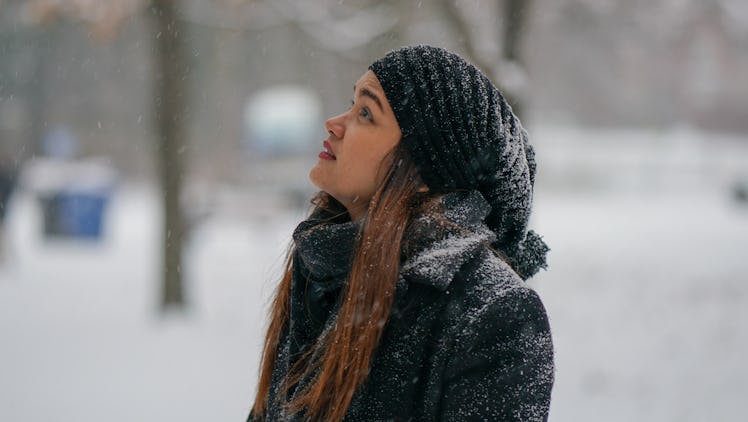 Young woman in winter snow