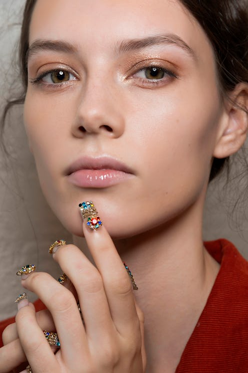 A young lady with botox posing for a photo