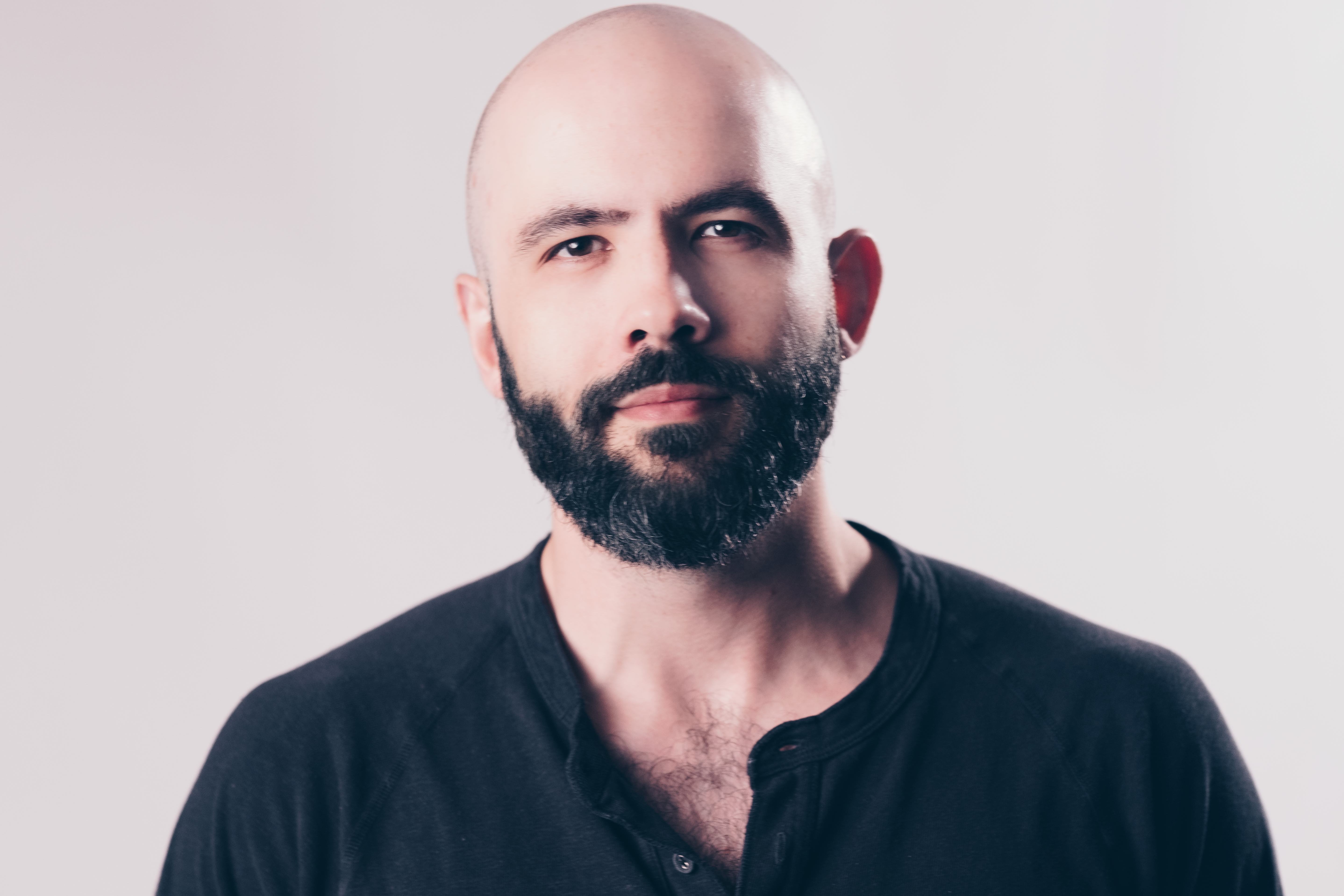 Fra' Massimo Corallo posing for a photo