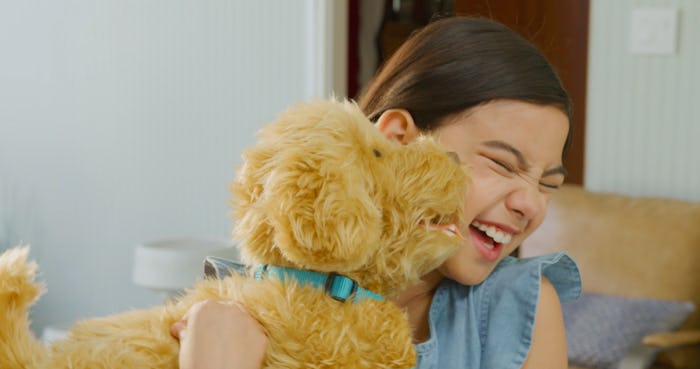 Your kids can interact with Moji The Loveable Labradoodle just like they would a real dog.