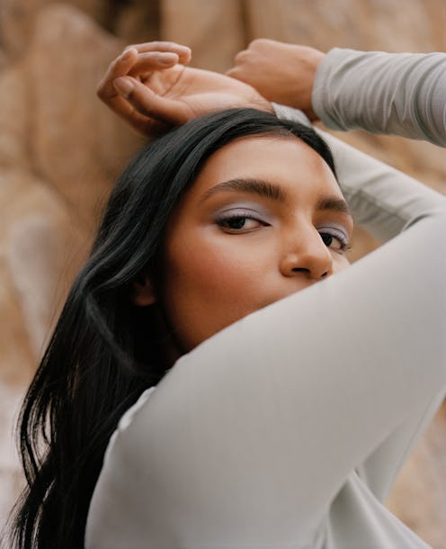 Woman wears Glossier's new Skywash Shadow