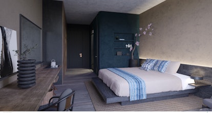 A bedroom in the Nobu Hotel: Chicago, with a large bed, desk and chair in brown and navy shades