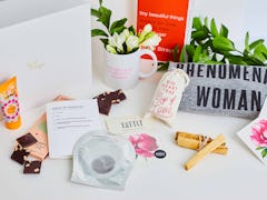 Small Packages' break-up box features tons of colorful amenities like face masks, chocolate, a mug, ...