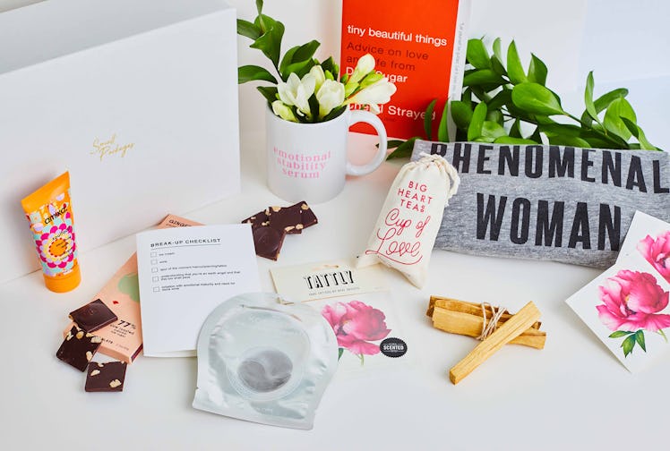 Small Packages' break-up box features tons of colorful amenities like face masks, chocolate, a mug, ...