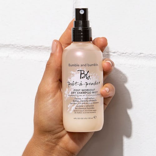 Bumble And Bumble's Pret-a-Powder Post Workout Dry Shampoo Mist helps to rid of sweat after working ...