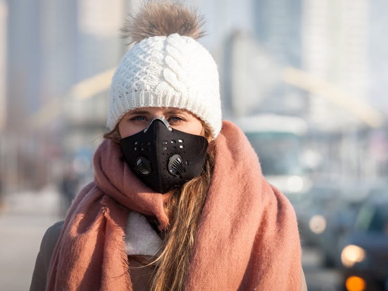 A mask rated N95 or N99 will best protect against pollution particles.