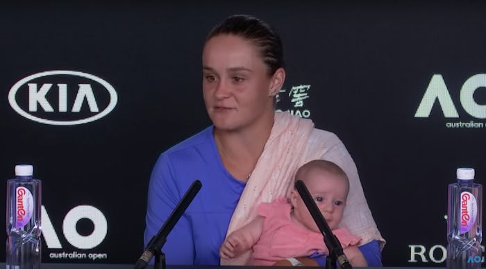 Australian tennis player Ash Barty spoke to reporters with her baby niece on her lap