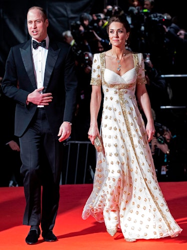 William and Kate walking the red carpet at the BAFTAs, keeping a distance between each other