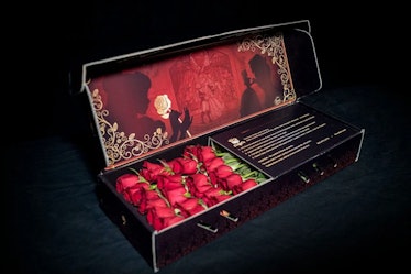 Two dozen roses sit in a black 'Beauty and the Beast'-themed box as part of the Roseshire x Disney c...