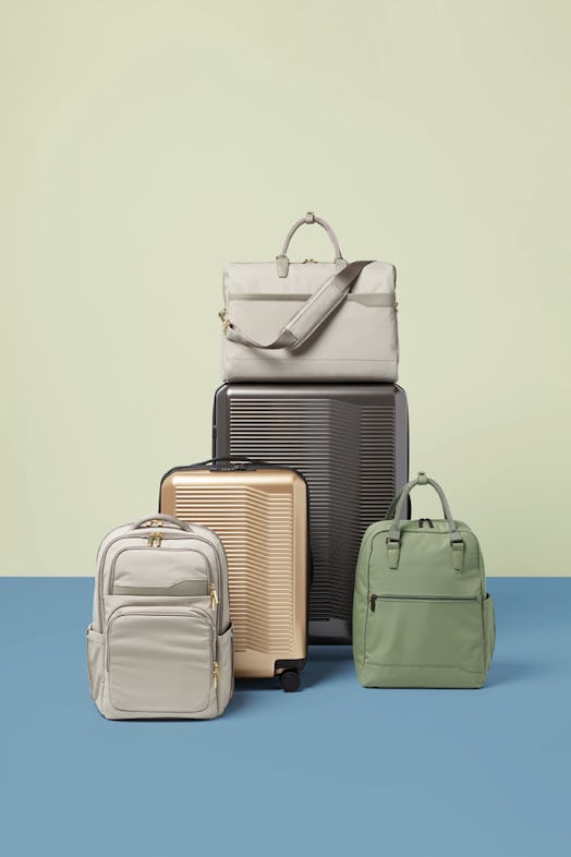 Target's Open Story luggage brand has various pieces like suitcases, a backpack, and weekender bag.