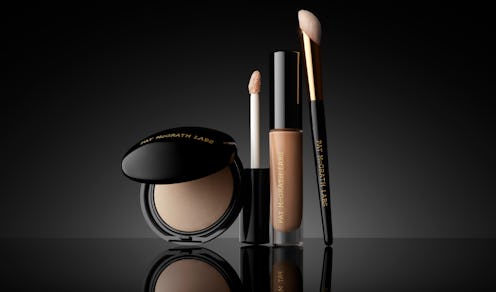 Pat McGrath Labs' Sublime Perfection Concealer System with powder, concealer, and brush.