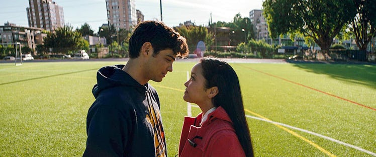 Lana Condor and Noah Centineo stand on a soccer field in 'To All the Boys I've Loved Before.'