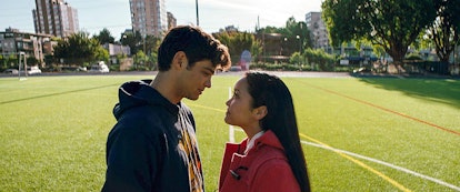 Lana Condor and Noah Centineo stand on a soccer field in 'To All the Boys I've Loved Before.'