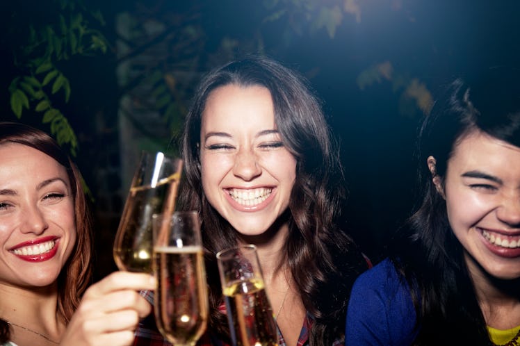 Three women with champagne on Galentine's Day