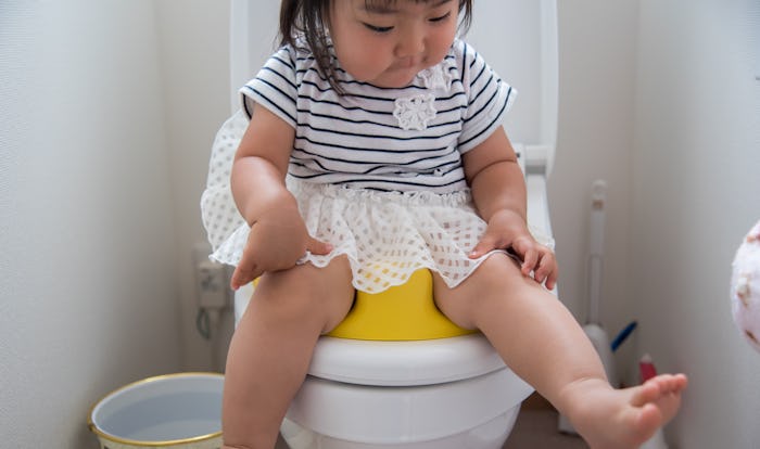 a little girl on the potty