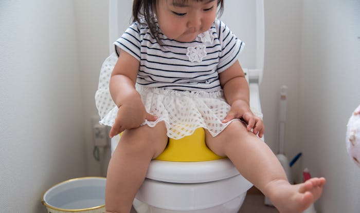 a little girl on the potty