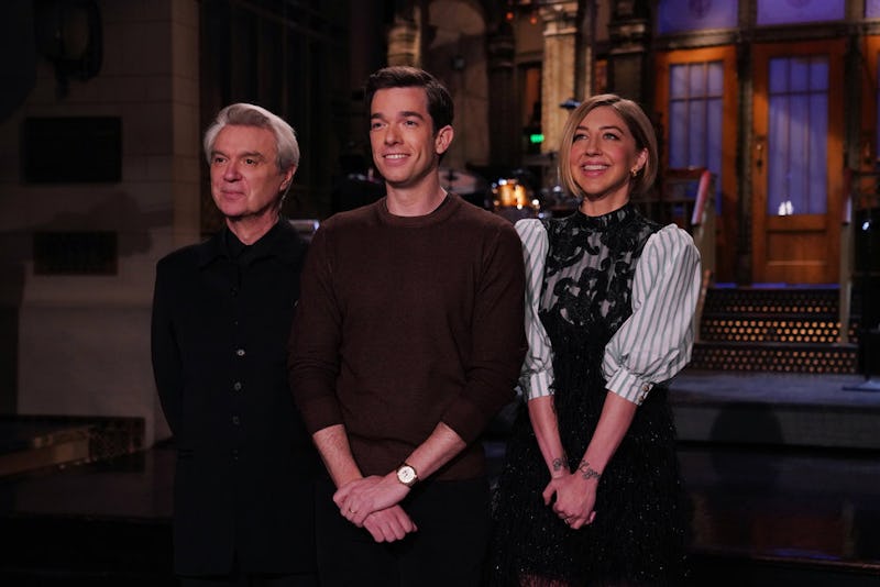 Musical guest David Byrne, host John Mulaney, and Heidi Gardner on Saturday Night Live
