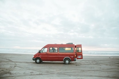 A 2004 Dodge Sprinter Motor Home sits on the beach in Oregon.