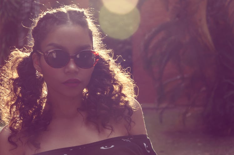 Young black woman wearing sunglasses