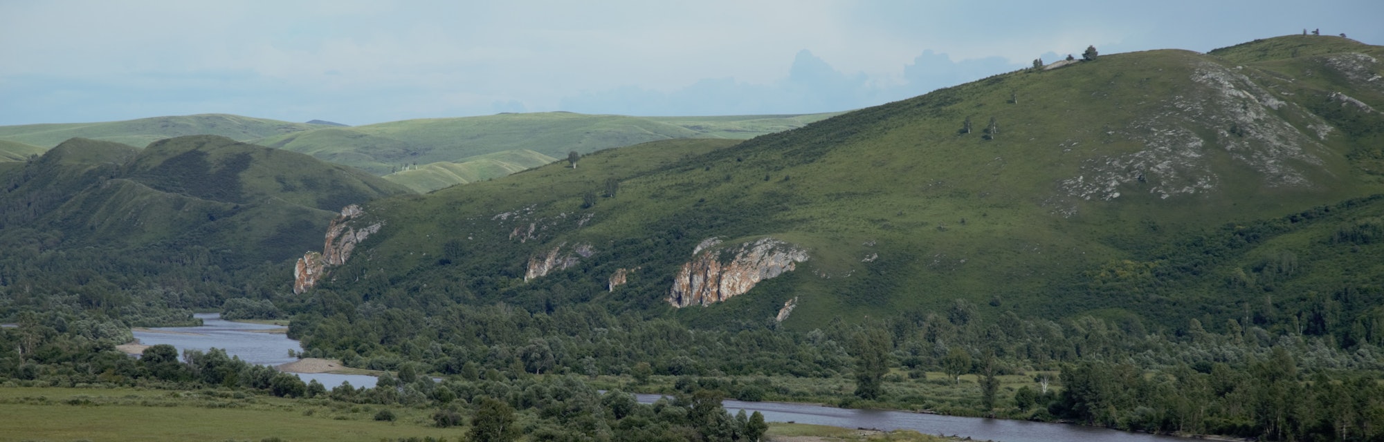 Neanderthal hunting grounds in southern Siberia — the Charysh River valley, with Chagyrskaya Cave in...
