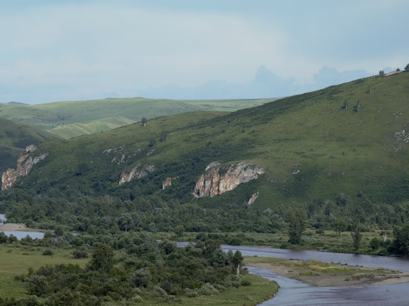 Neanderthal hunting grounds in southern Siberia — the Charysh River valley, with Chagyrskaya Cave in...