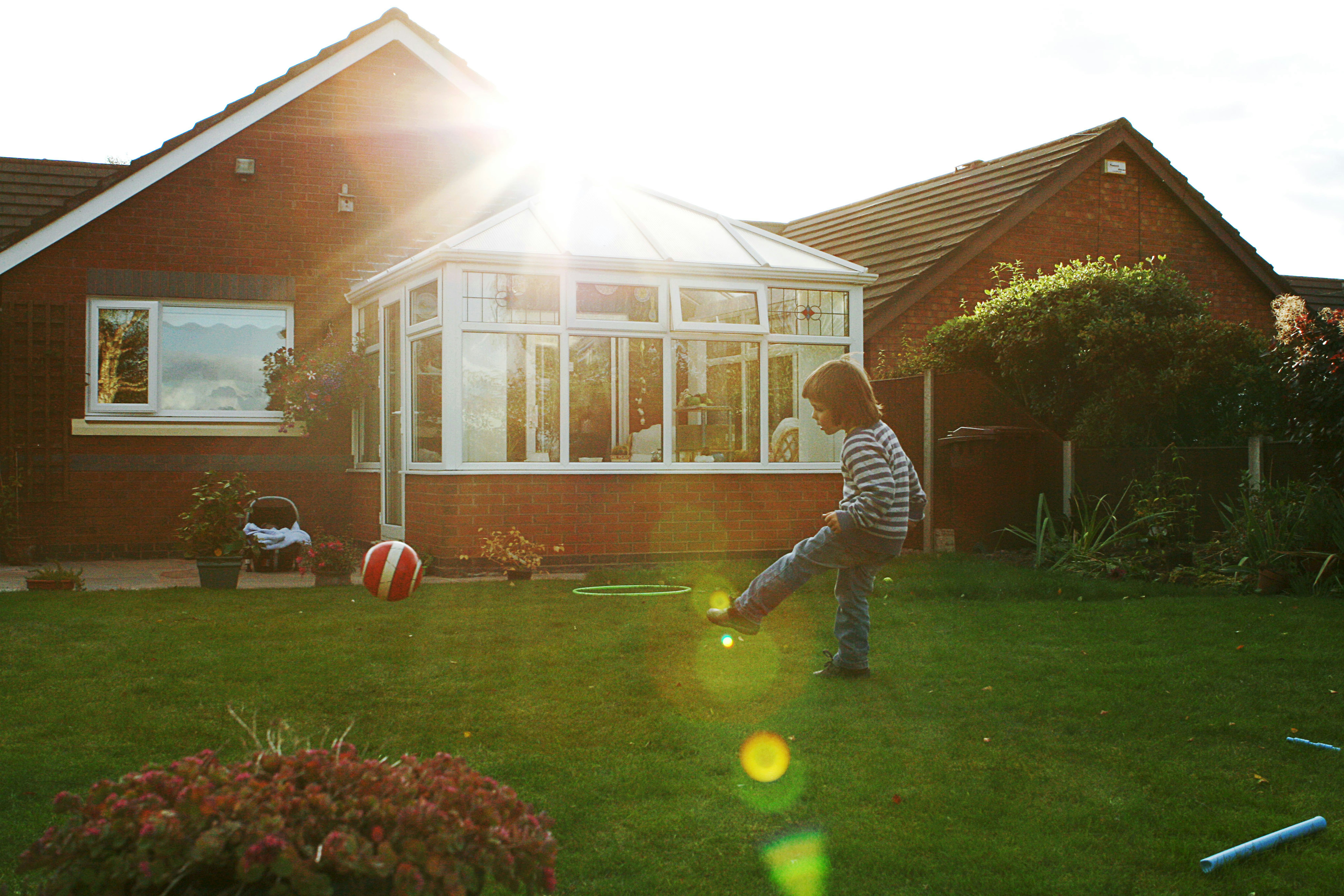 A child kicks a ball