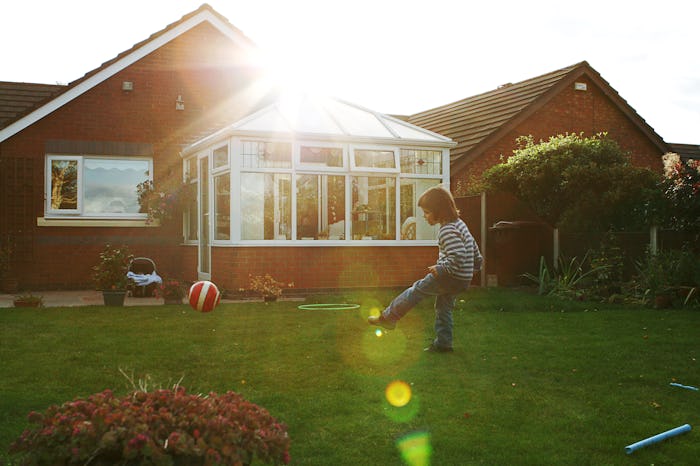 A child kicks a ball